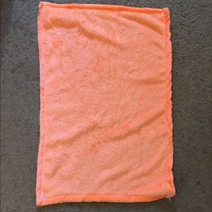 Small rectangular orange fleece blanket